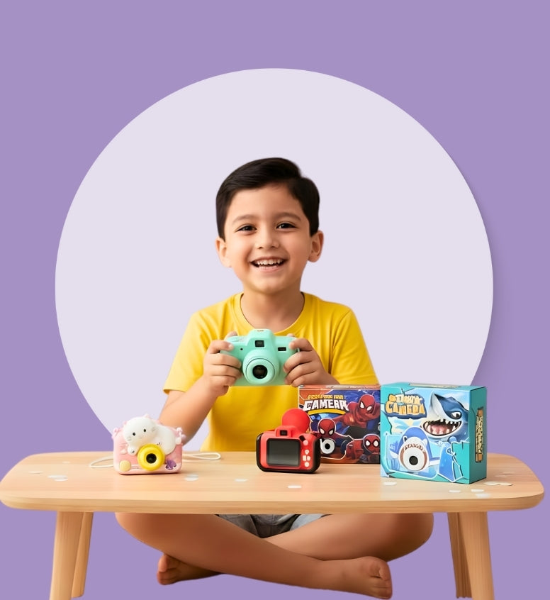 Young child capturing images with cameras, learning and having fun - Baby Nest